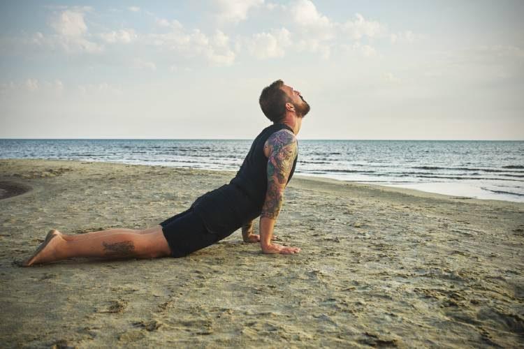 man-practicing-yoga-in-various-poses-asana-2021-08-26-15-59-23-utc-web