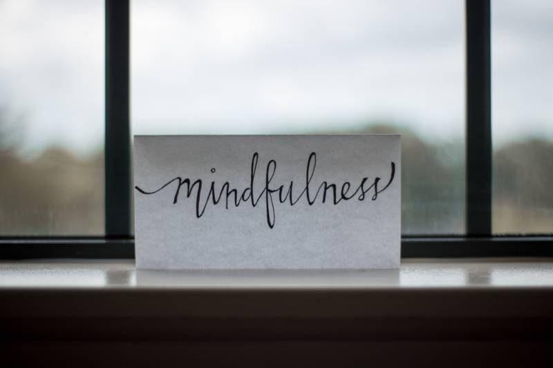 mindfulness sign on window